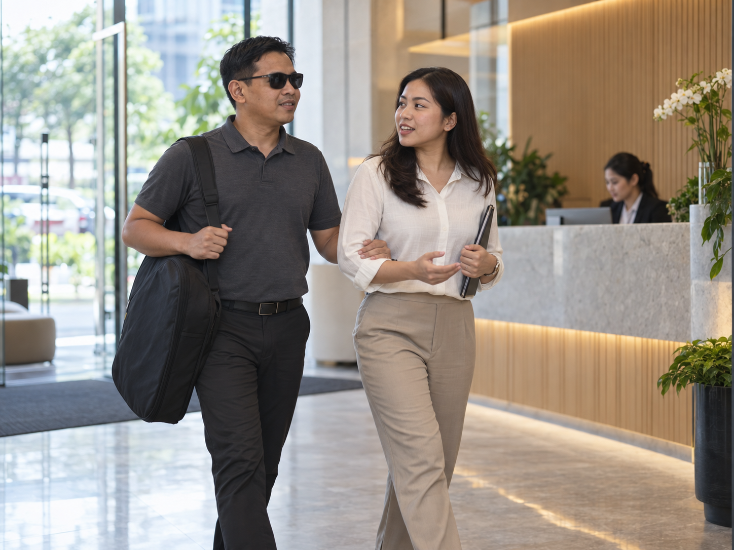 A Woorut therapist arriving at an office and speaking with an HR representative.
